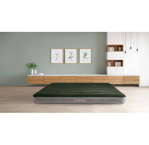 Tv Cabinet And Display With On Wood Flooring And Pastel Green